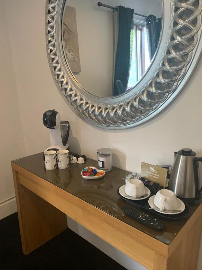 The Swan @ Stoford Hotel Bagian luar foto A Nespresso coffee machine in a hotel room